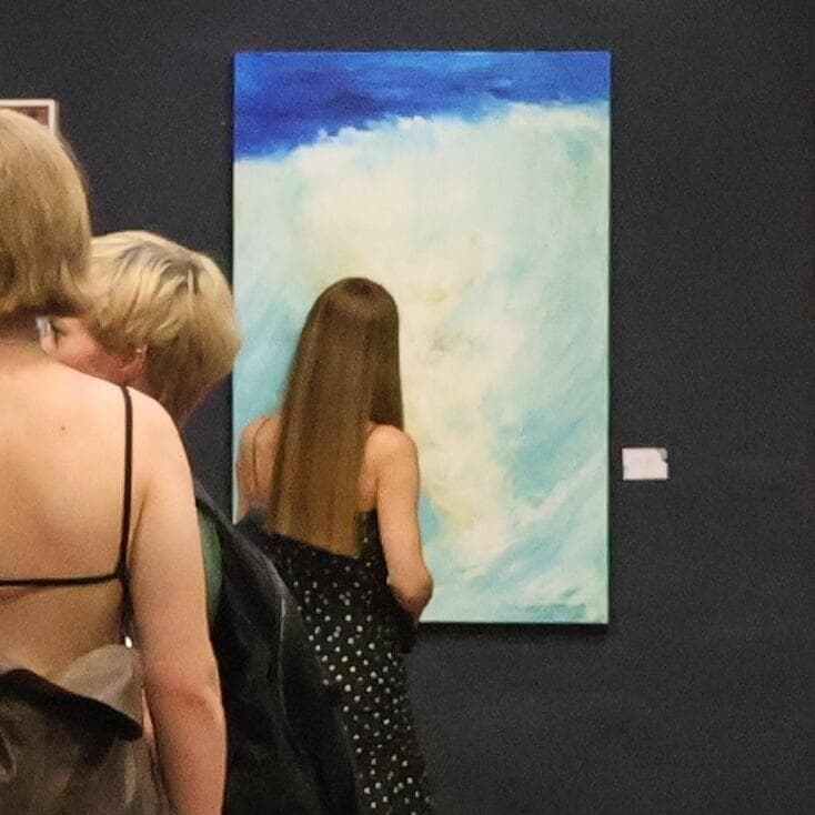 Come so close that your nose is almost touching the canvas.